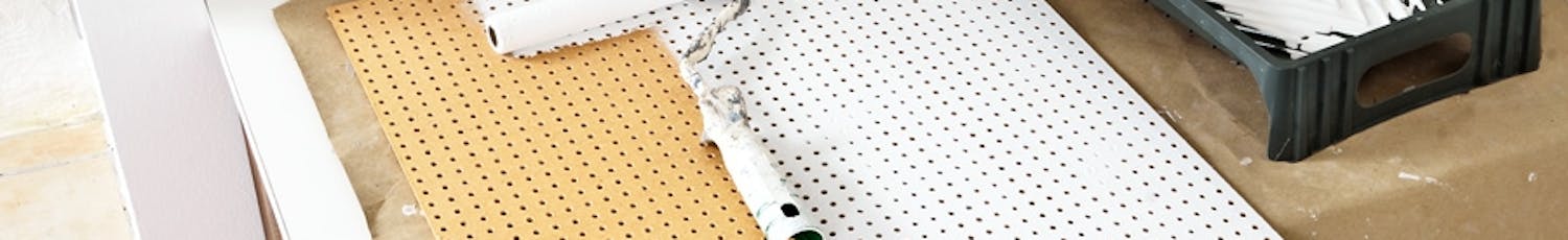 Masonitskiva: Perforerad masonitskiva Masonitskivan finns också i en perforerad version som denna.